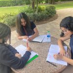 Immokalee Foundation middle school students Carol, Marcella and Angela learn to support each other on their educational journeys